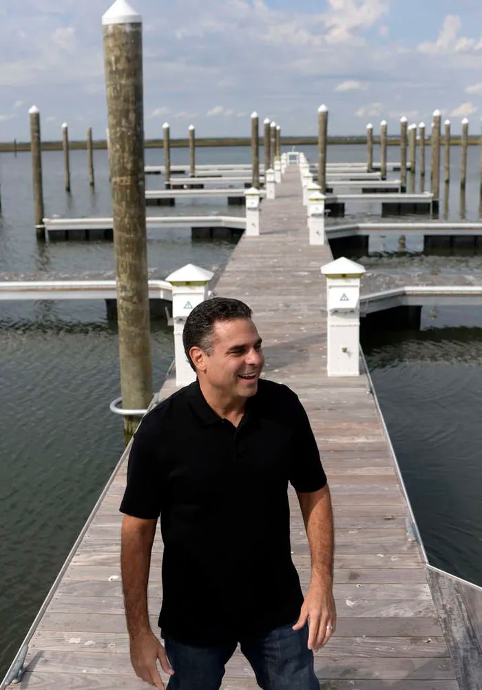 Marina owner Salvatore Calabrese at his rebuilt docks and expanded slips in Margate.